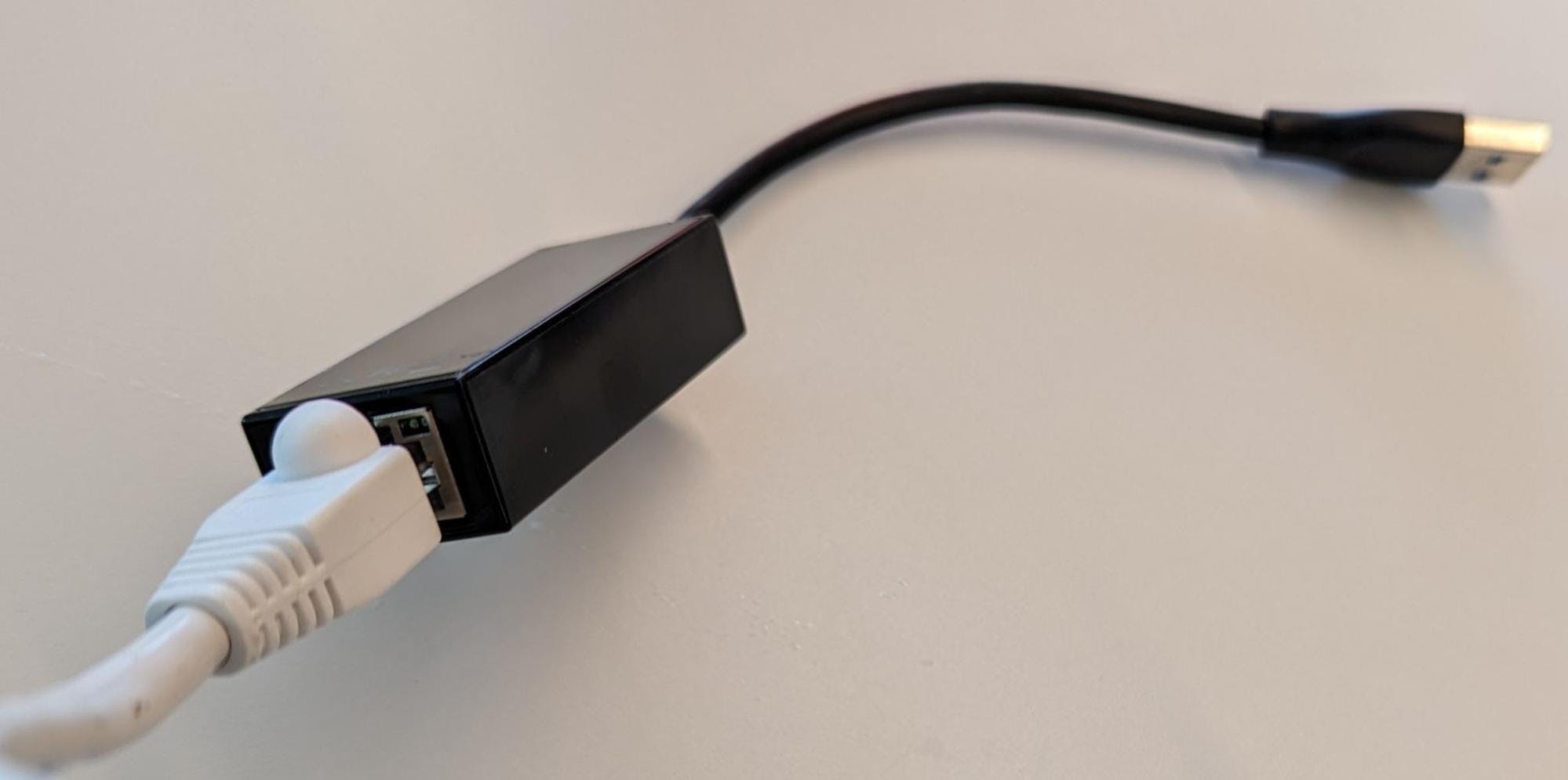 A USB-A Ethernet dongle.